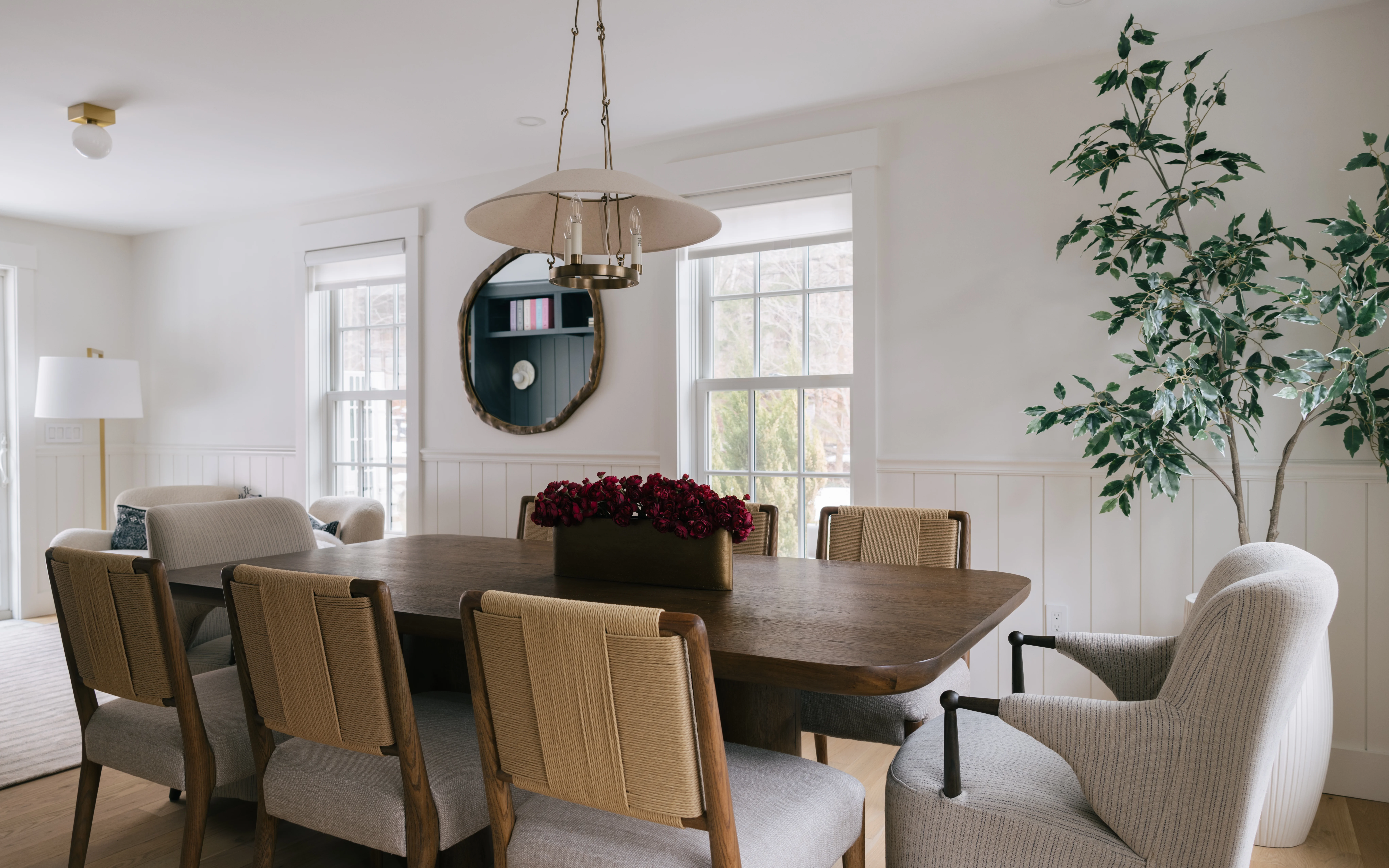 Close-up of library table details with curated styling and warm ambient lighting